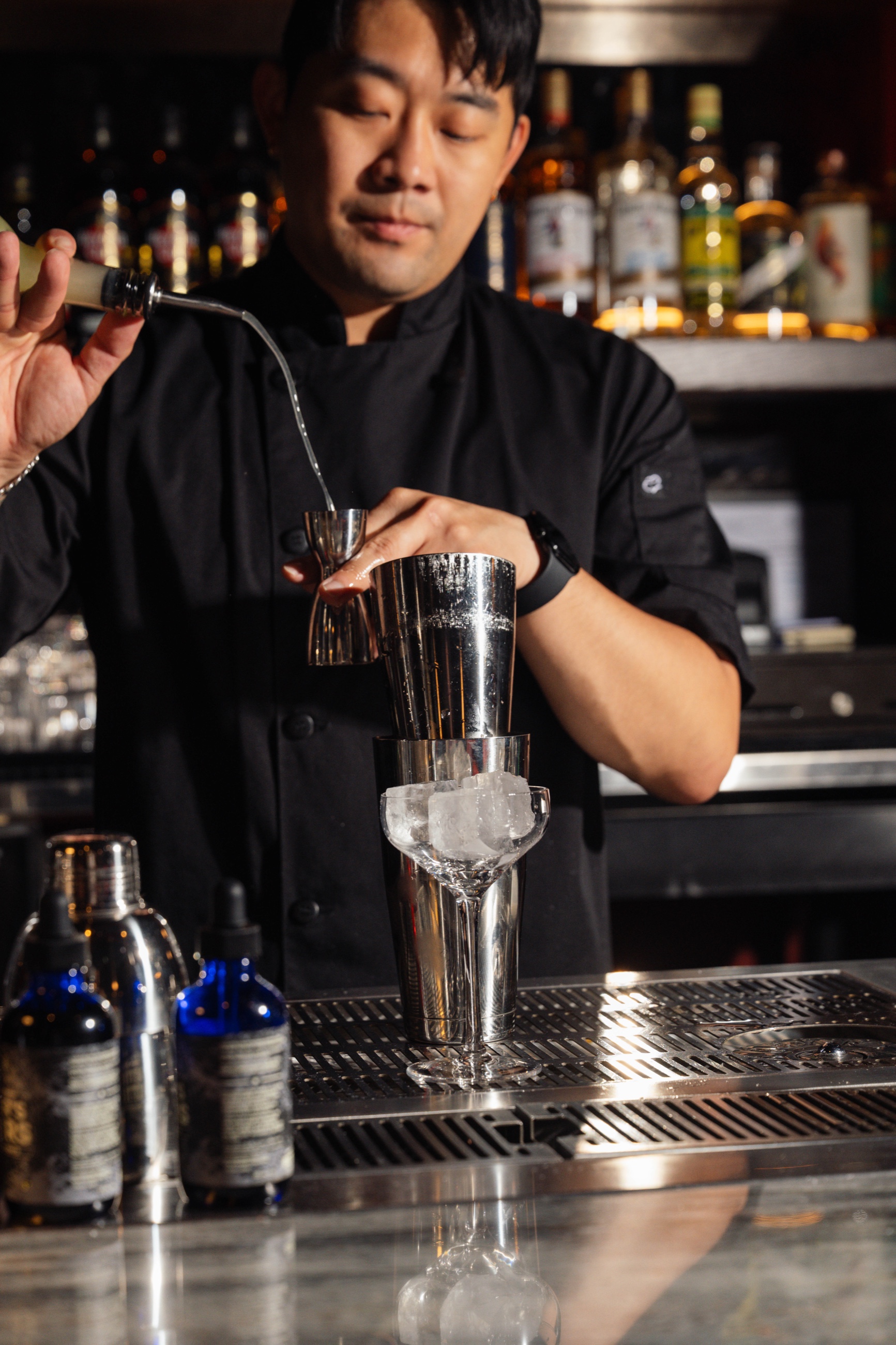 Bartender pouring at the bar